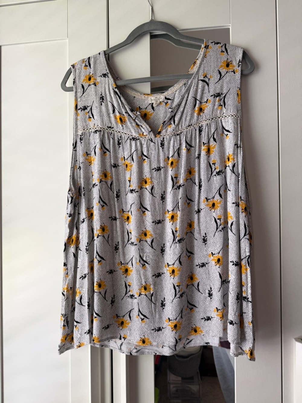 Sleeveless White Floral V-Neck Blouse with Yellow Accents